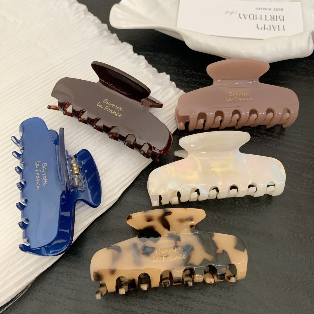 Por que o clipe de garra de tubarão de acetato de celulose retrô francês de 8,3 cm é obrigatório para marcas modernas de acessórios de cabelo?